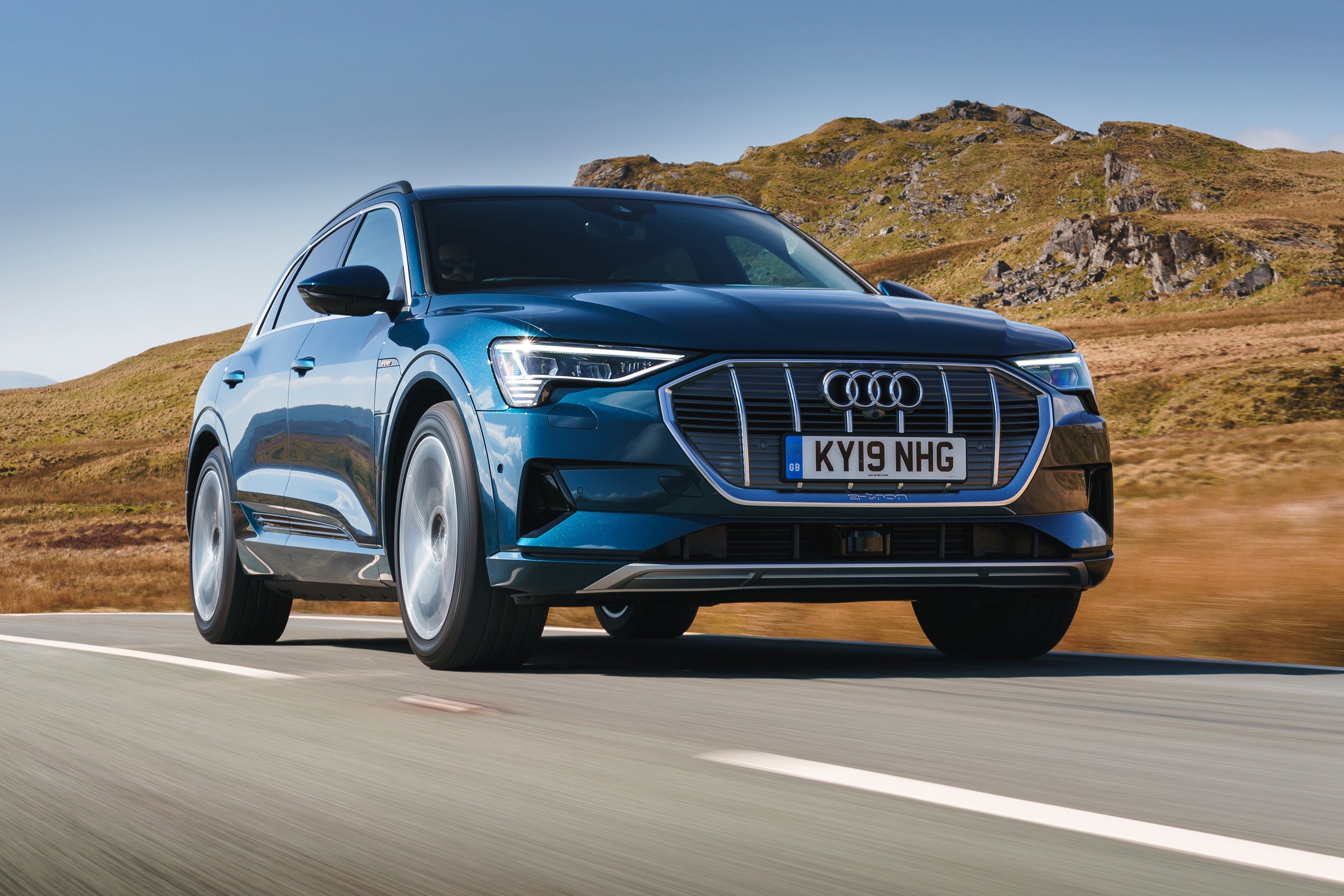 Audi e-tron (2019-2022) Review: exterior front three quarter photo of the Audi e tron on the road