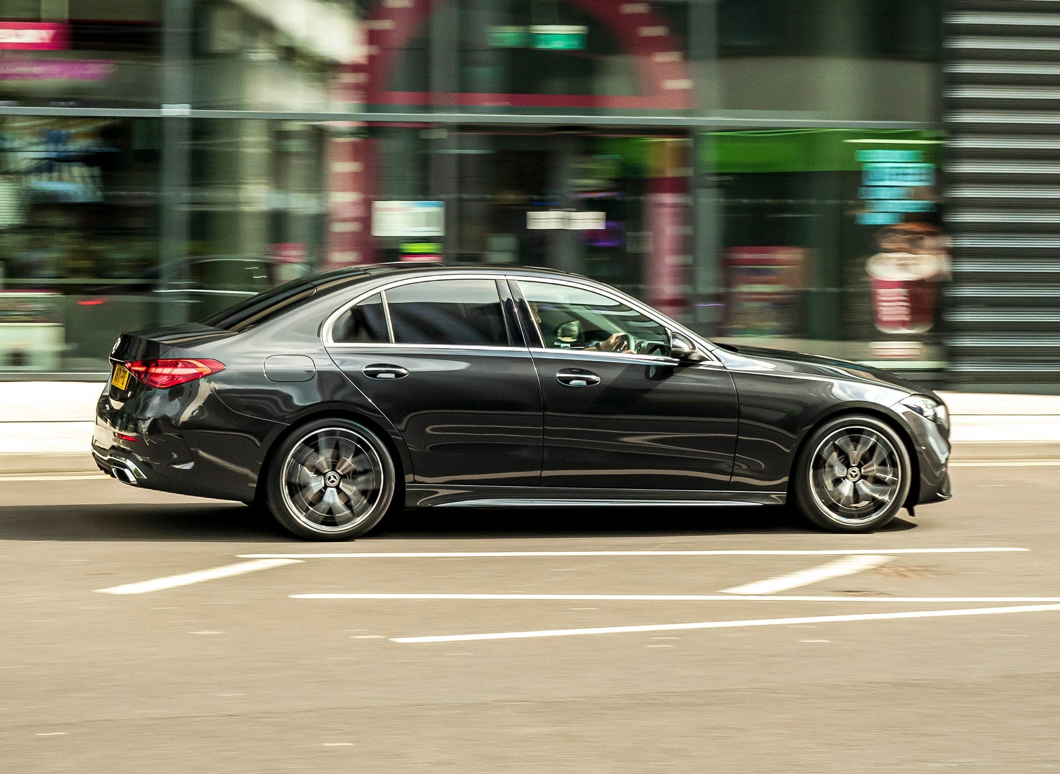 Mercedes-Benz C-Class Review 2024: exterior side photo of the Mercedes-Benz C-Class on the road