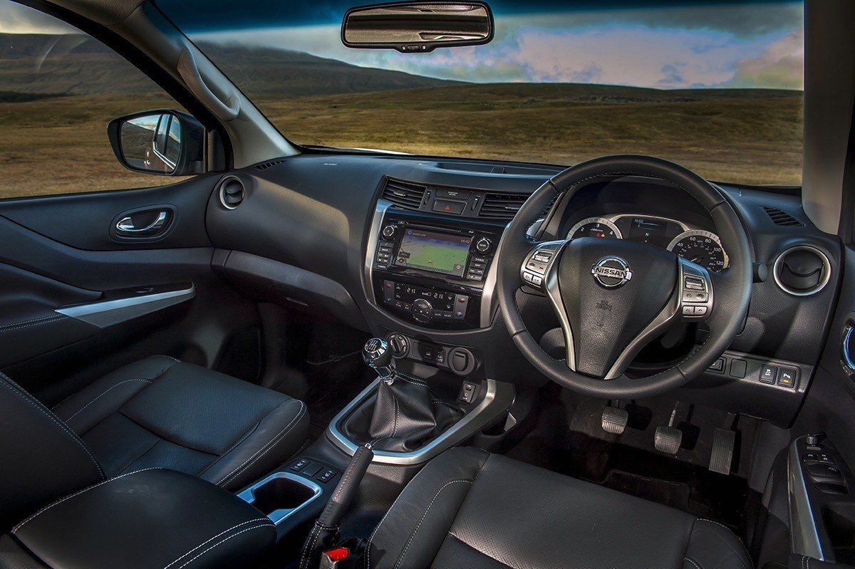 Nissan Navara (2014-2022) Review: interior close up photo of the Nissan Navara dashboard