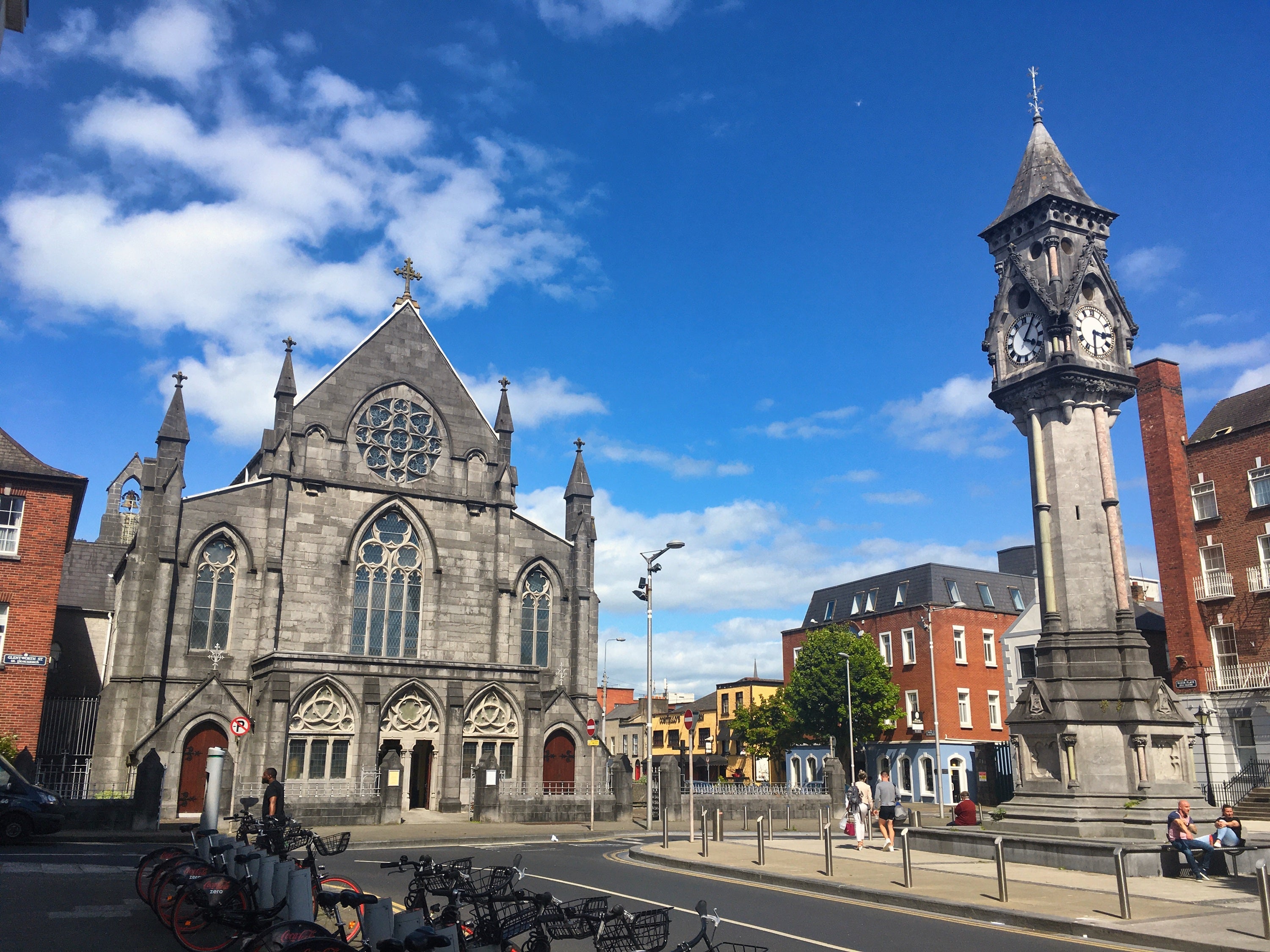 A large stone building with a clock tower
