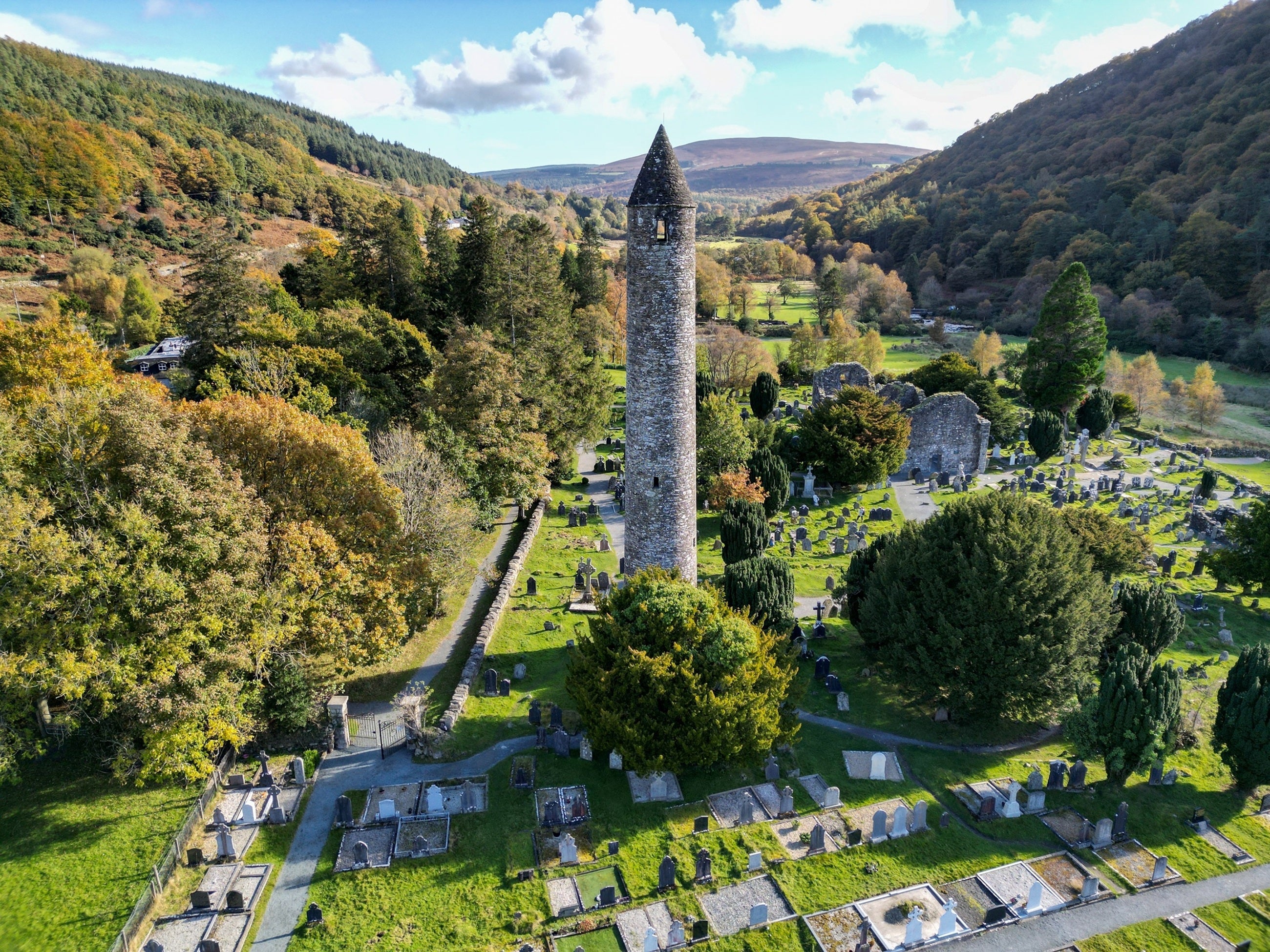 A round tower in a cemetery