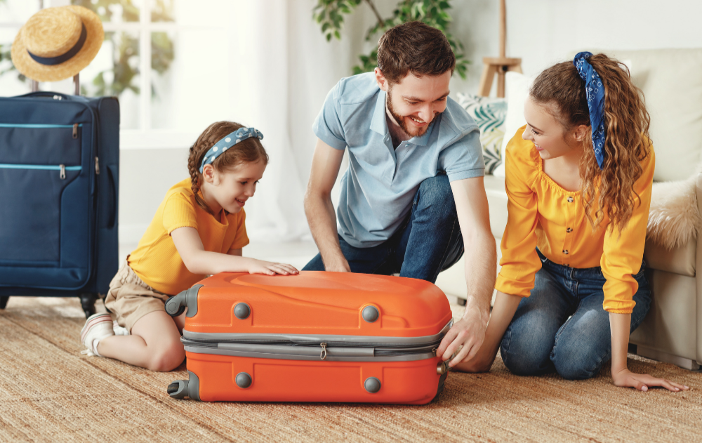 Muž a žena s kufrom