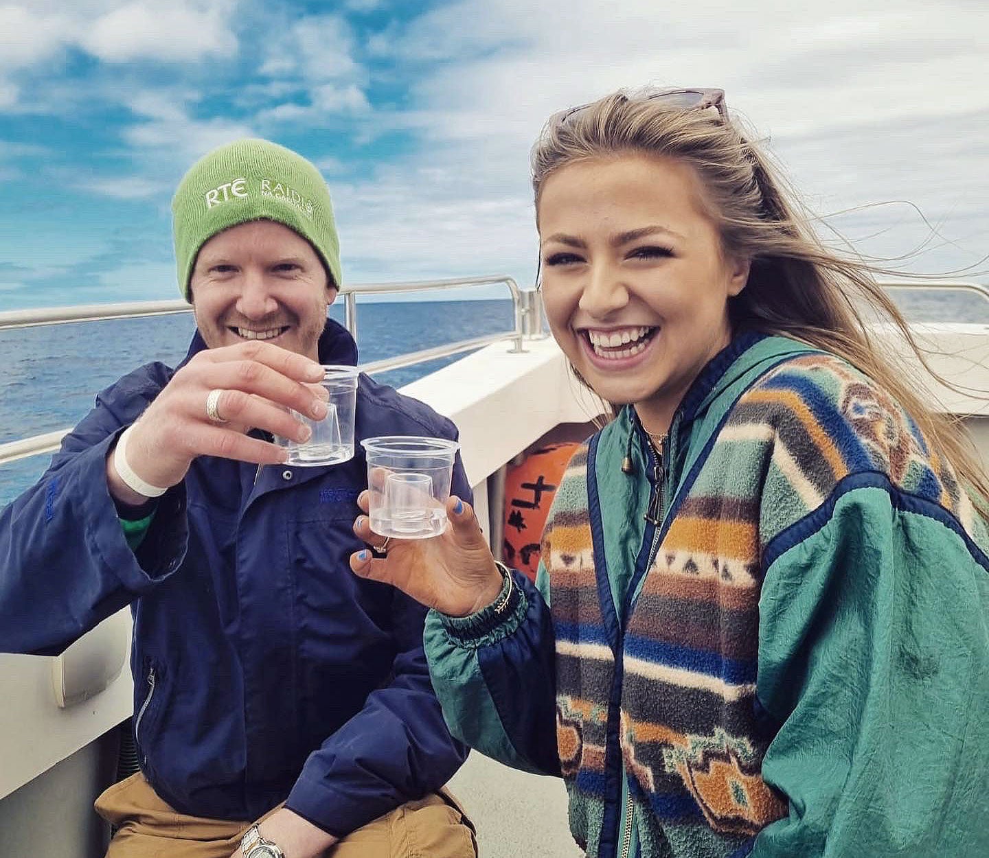 Couple enjoying a boat trip with Donegal Music Trails
