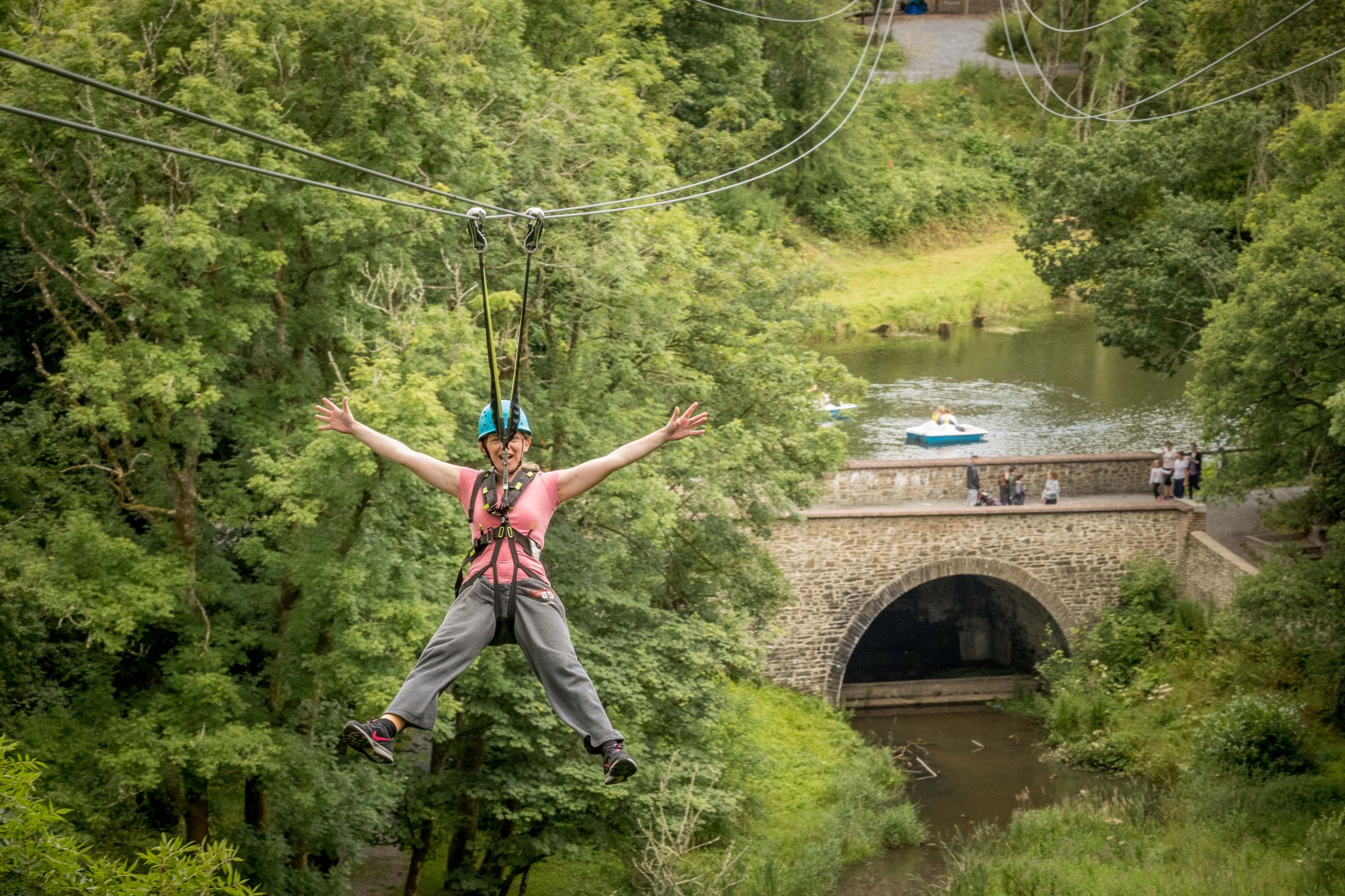 Image of a woman ziplining in Castlecomer Discovery Park in County Kerry