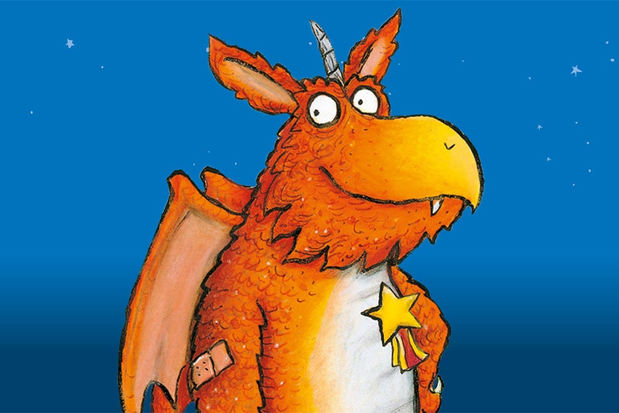 Cartoon image of a smiling orange dragon
