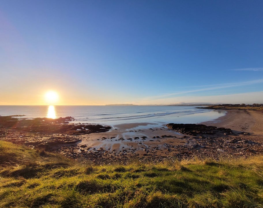 Sunset over a rocky beach