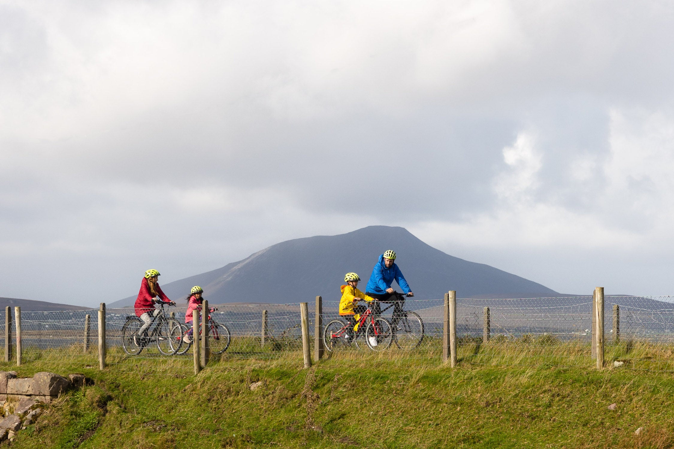 A family cycling the Great Western Greenway in County Mayo