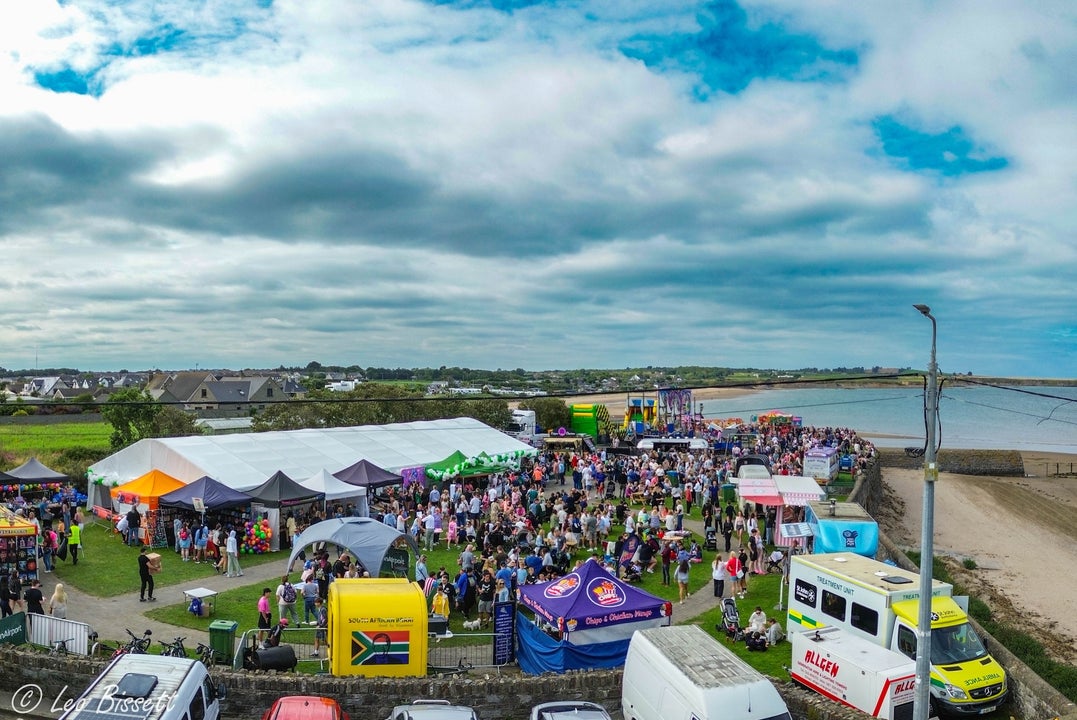 A busy festival park 2025