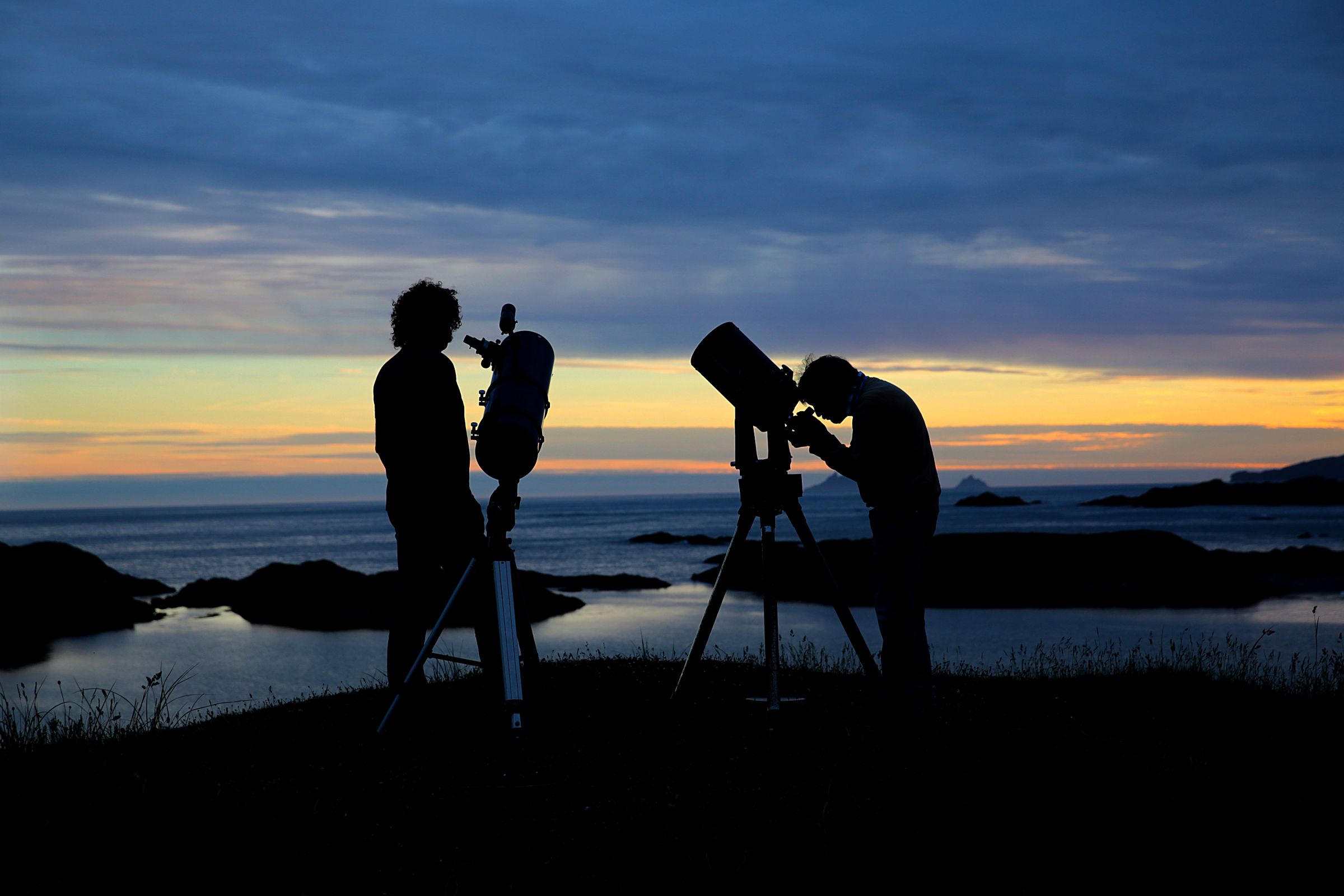 Image of two people looking at the stars in the Dark Sky Reserve in County Kerry