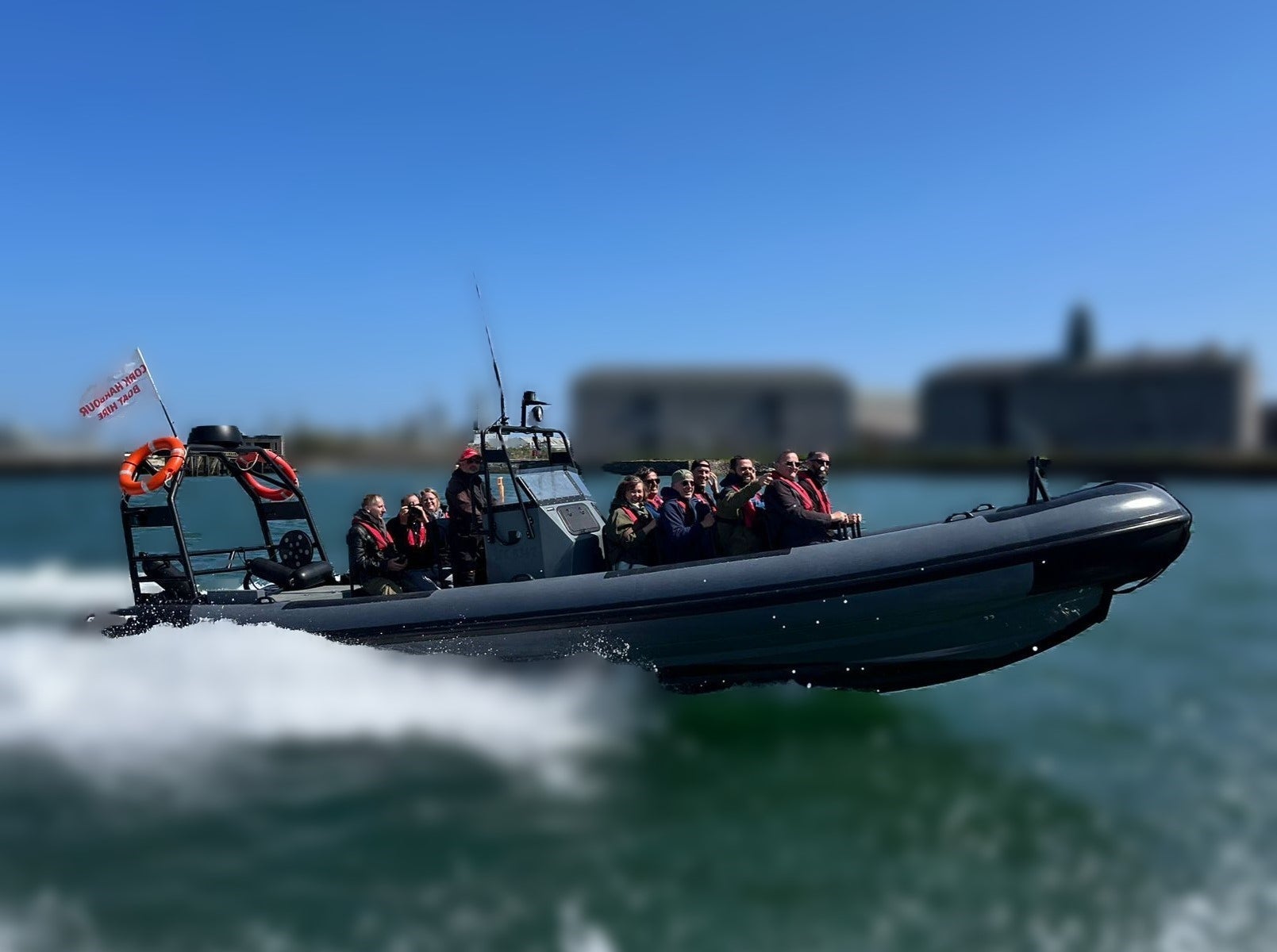 Group of people on a small boat out at sea
