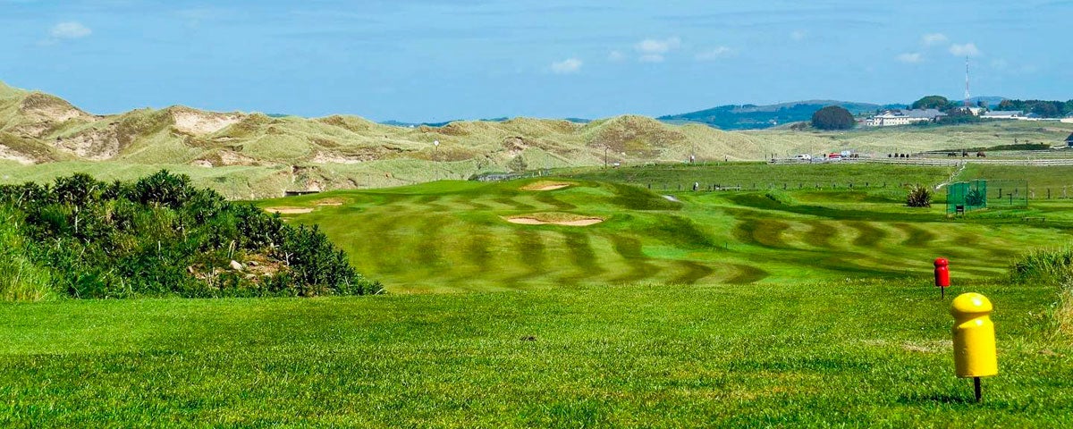 Bundoran Golf Club fairway with sand dunes in background