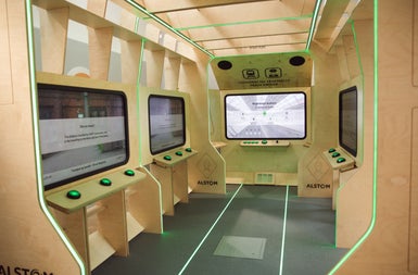 Interior of railway carriage modernised with screens and consoles