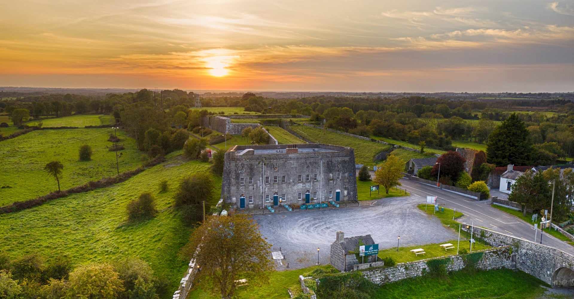An aerial view of Shannon Fortifications with the sun setting behind the building