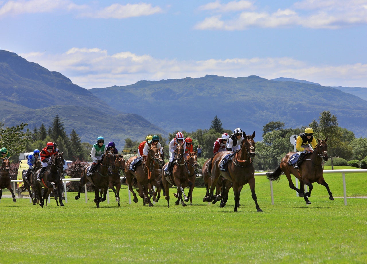 Jockeys racing during a summer racing festival at the Killarney Racecourse