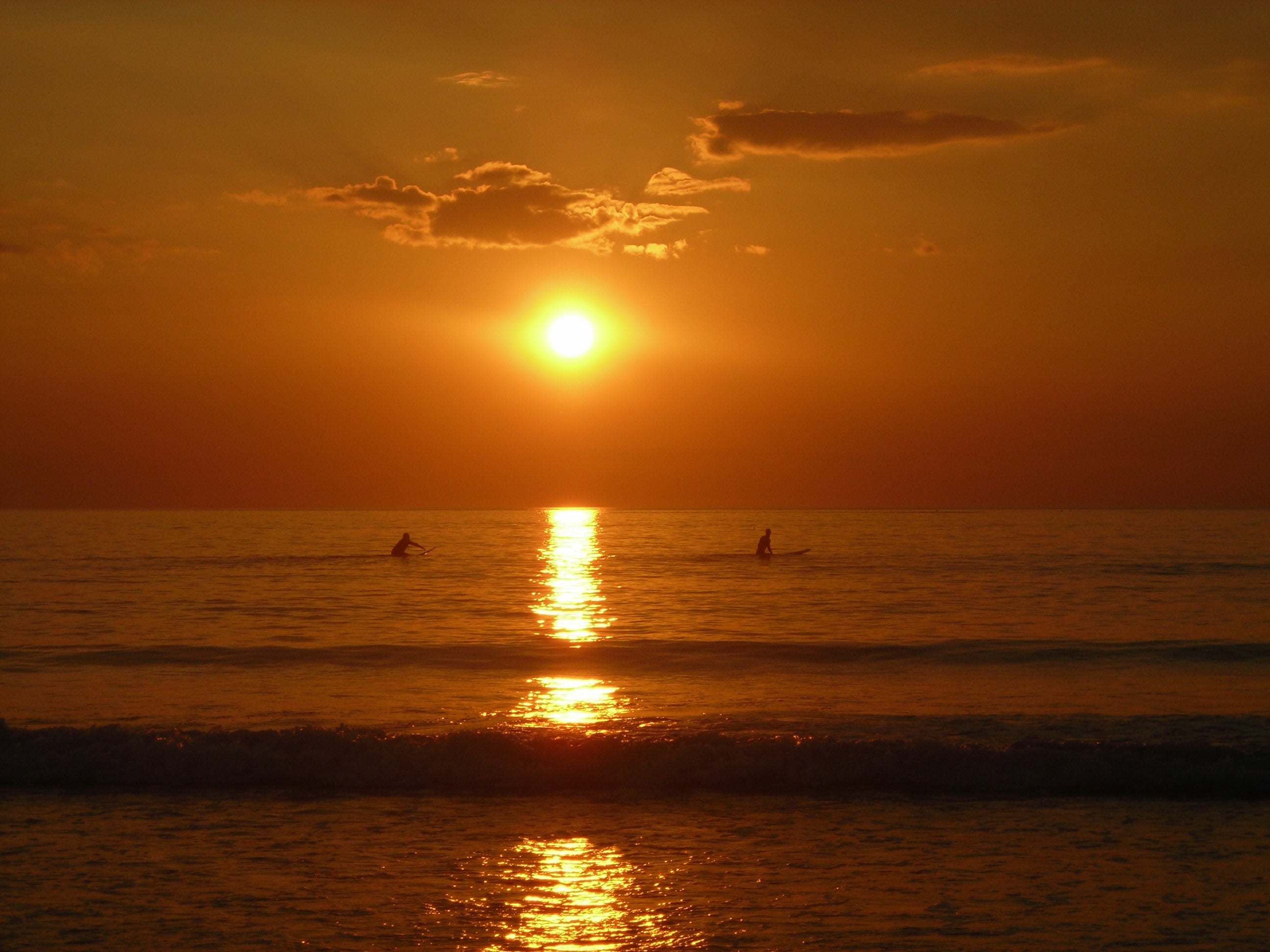 Surfers at Strandhill Beach, Co Sligo at sunset