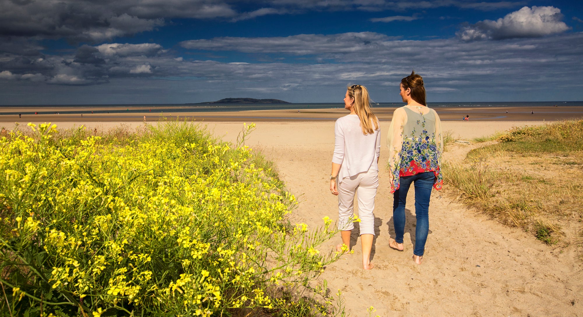 Two women on Malahide Beach in County Dublin