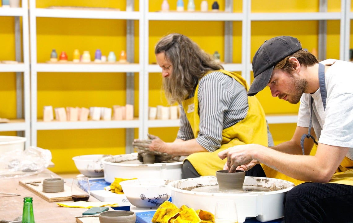 A view of the wheel throwing room at Throwing Shapes Ceramics Studio