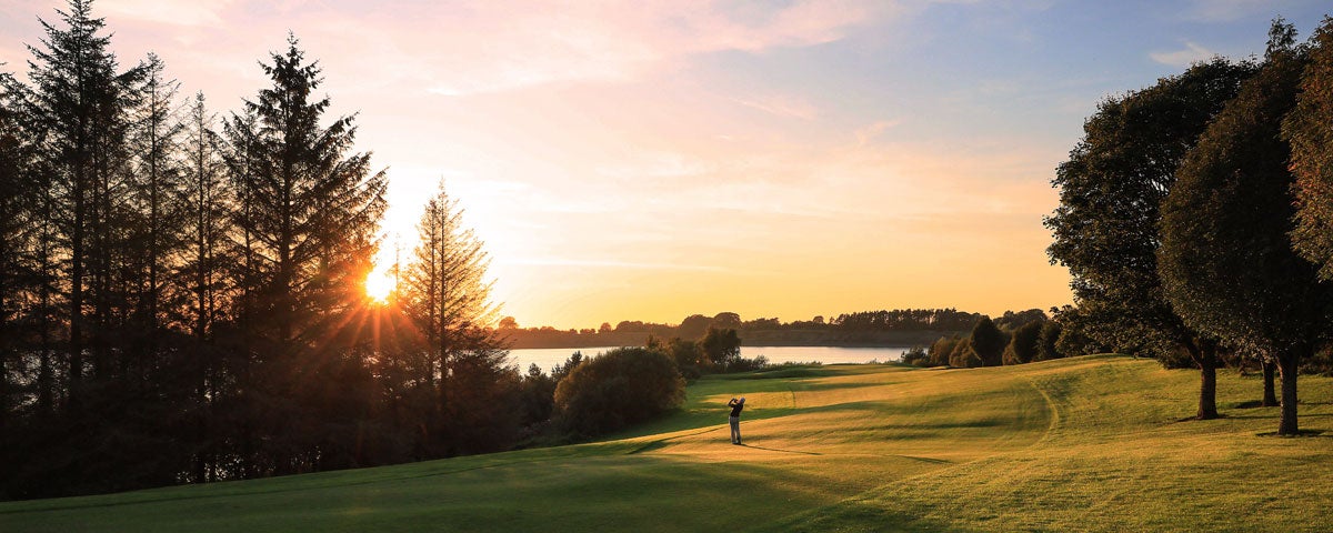Golfer teeing off at Tulfarris Hotel Golf Club Blessington County Wicklow