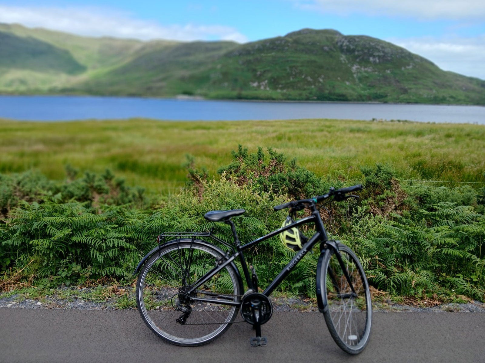 Bike from Sea Breeze Bike Hire parked by a lake