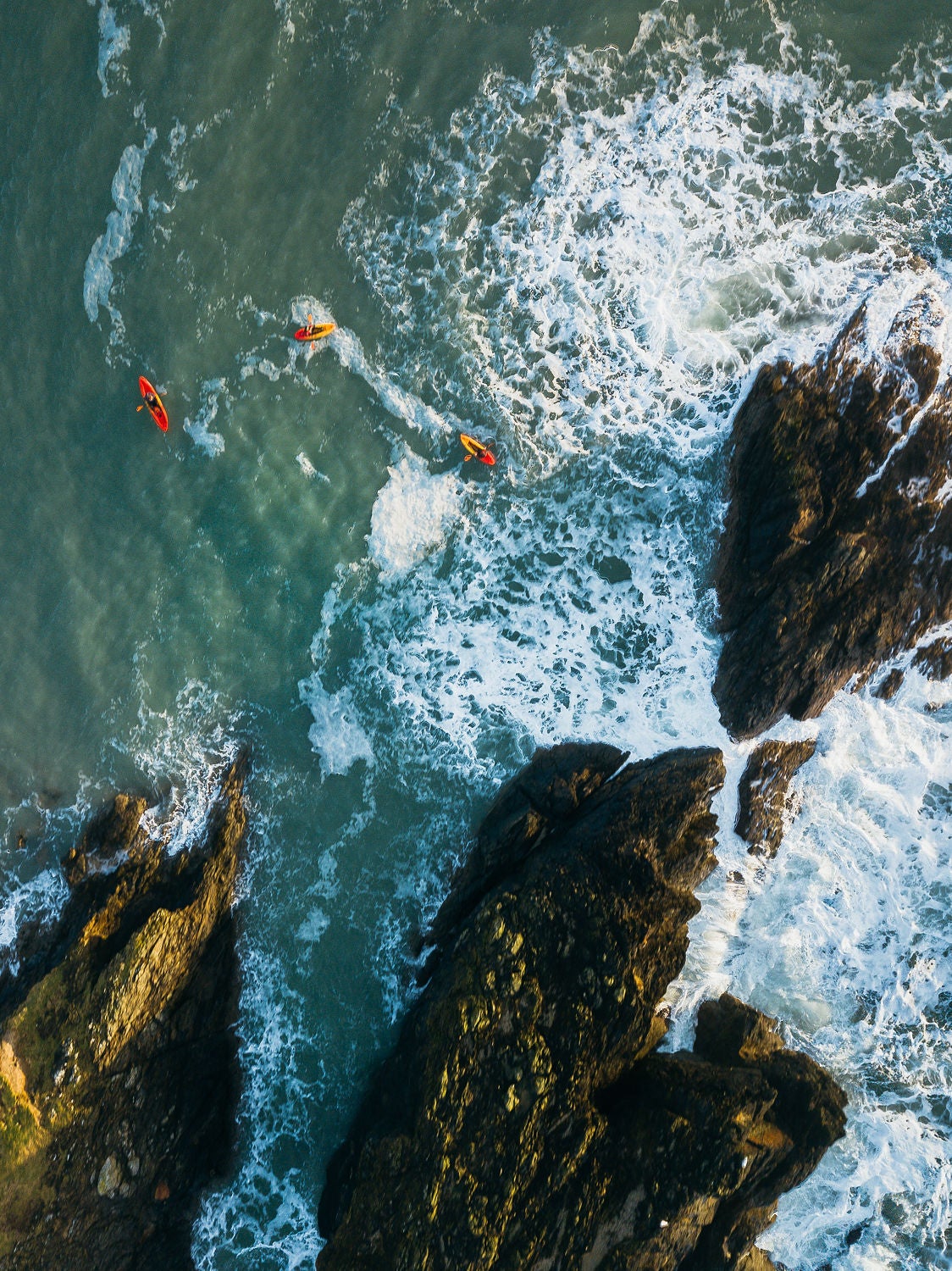 Aerial view of kayakers in the water at Hook Head.