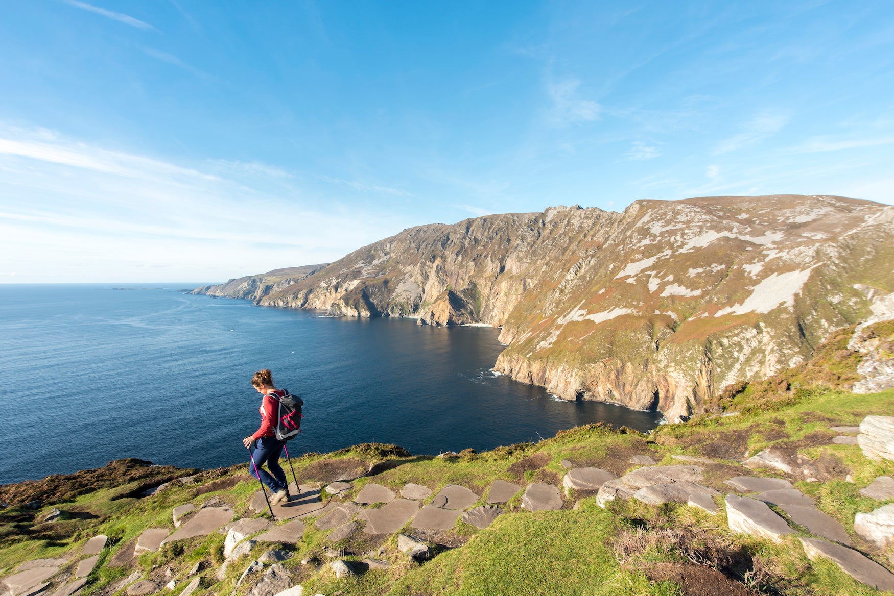 A woman hiking Sliabh Liag (Slieve League) in County Donegal