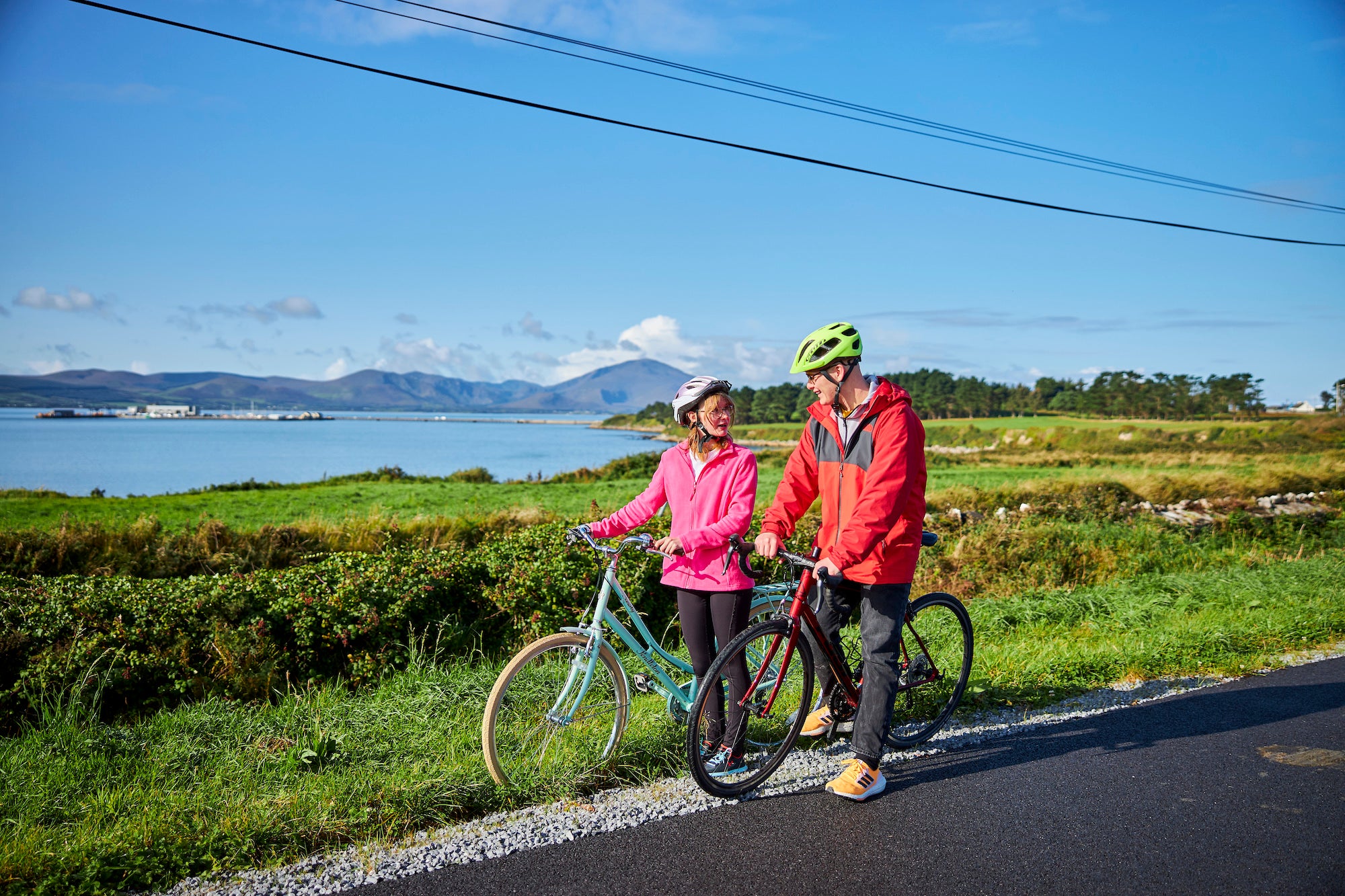 Cyclists on the Tralee-Fenit route of the Kingdom of Kerry Greenways in Co Kerry