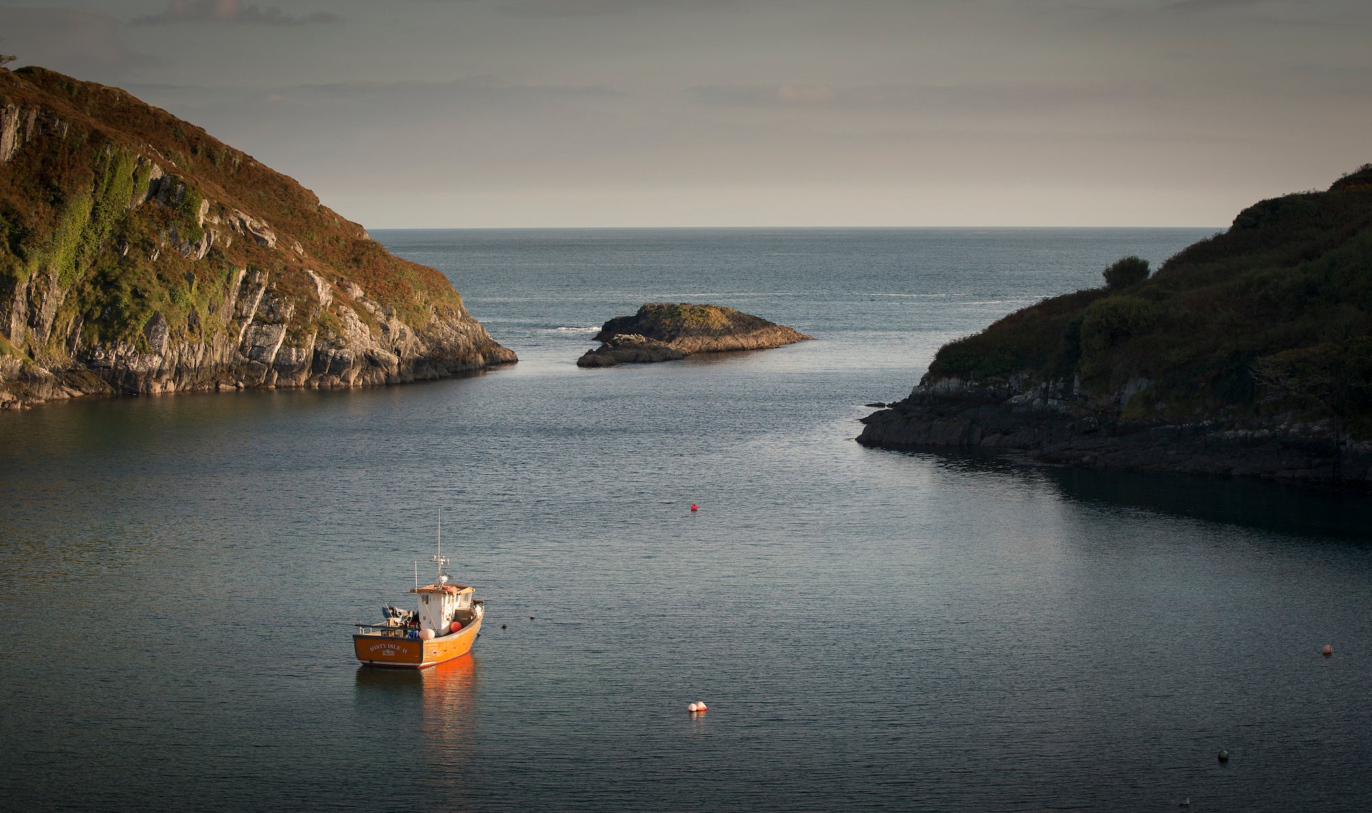 A boat cruising in Lough Hyne, Co Cork