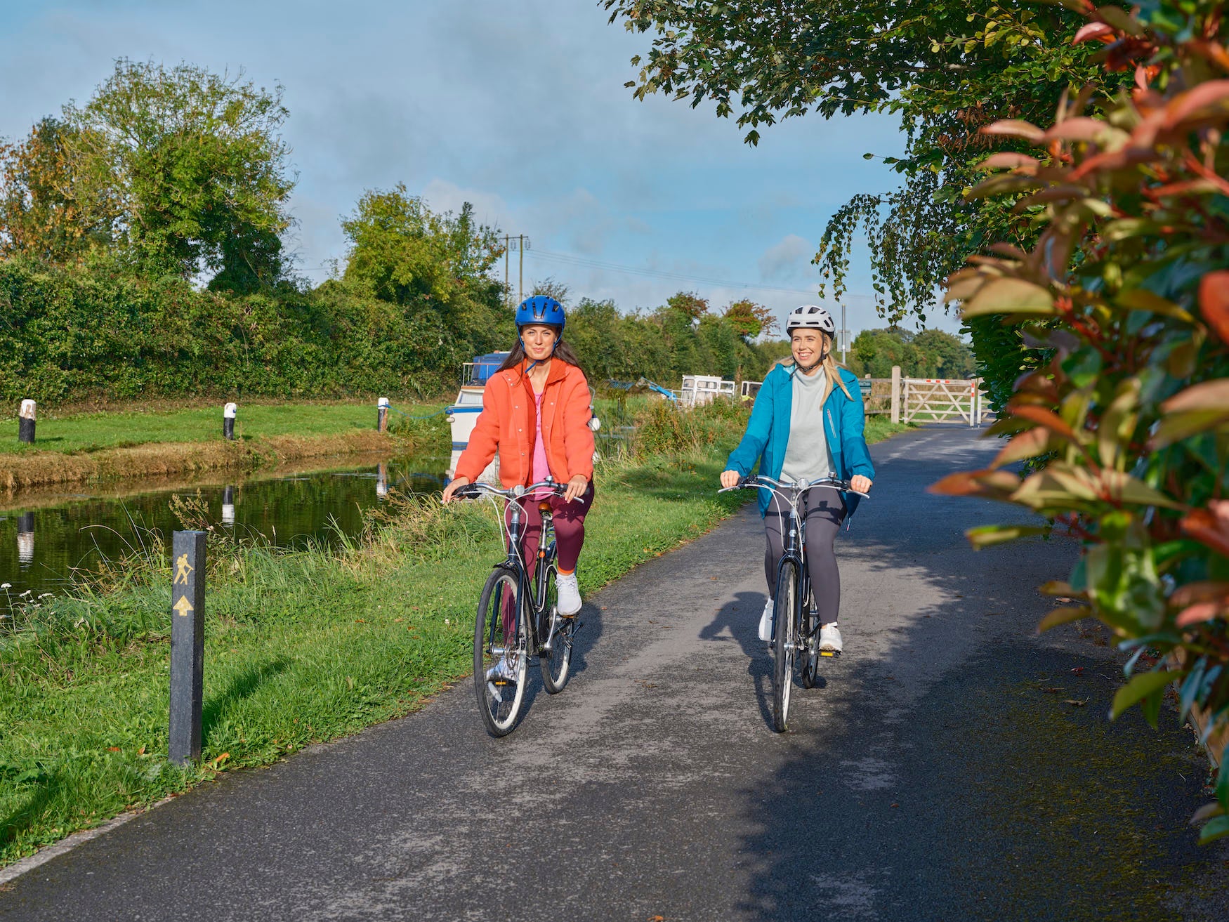 Two women cycling the Royal Canal Greenway
