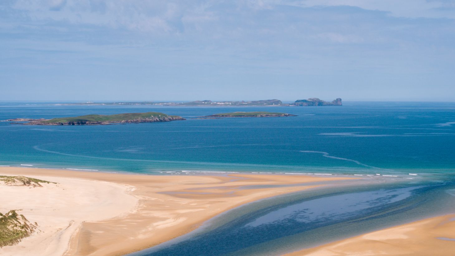 Blue water and golden sand at Tory Island, Co. Donegal