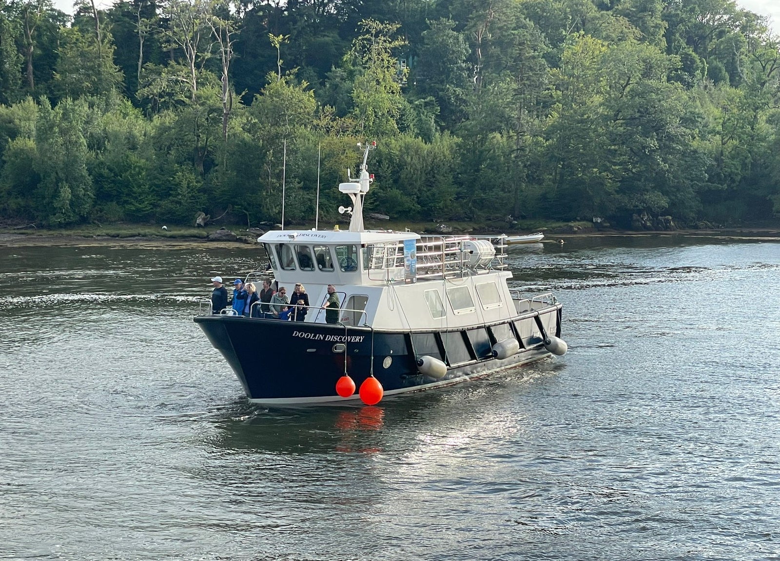 A tour boat with passengers at sea