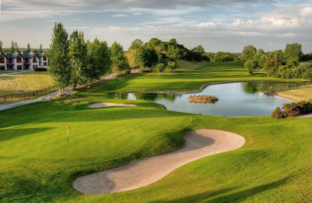 Esker Hills Golf Club aerial view of the green, sand trap and water feature