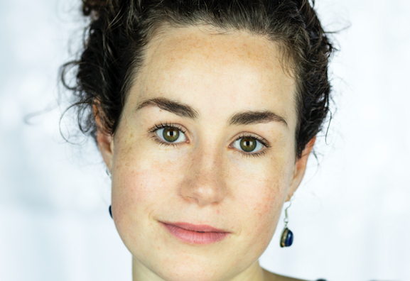 Creative Writing & Wellness with Grace Kelley, close up view of gently smiling woman