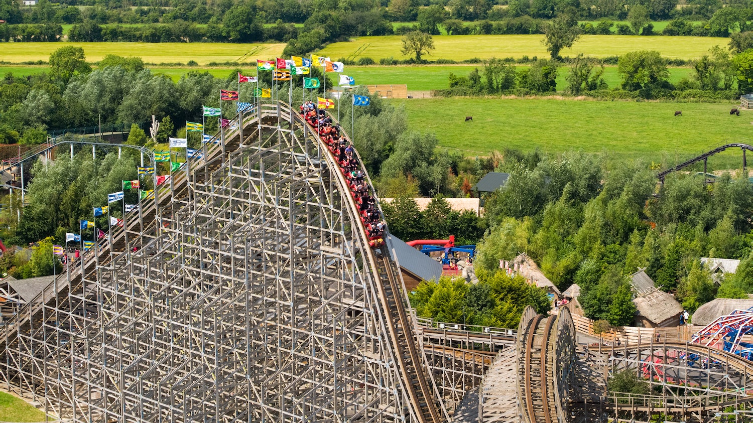 Aerial image of people riding the wooden rollercoaster at Emerald Park in County Meath
