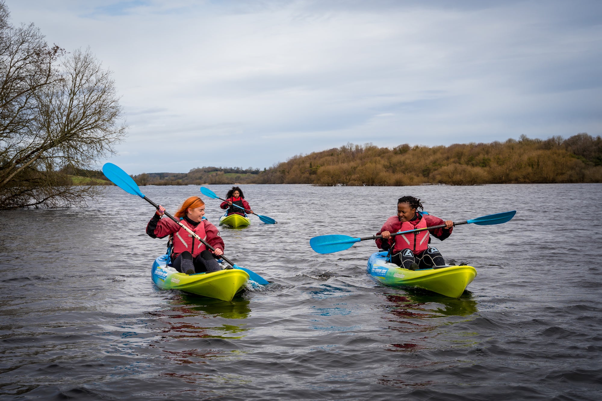 Three people kayaking in Cavan with Cavan Adventure Centre 
