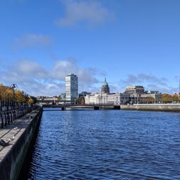 View of Dublin's custom house with quays on either side and a river to the forefront