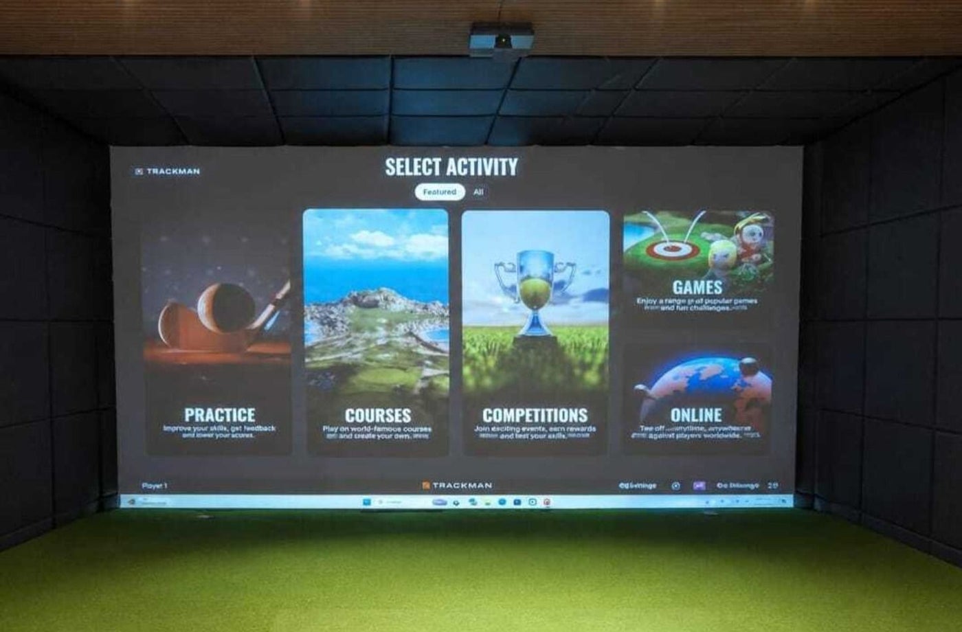 A large screen with golfing options on display
