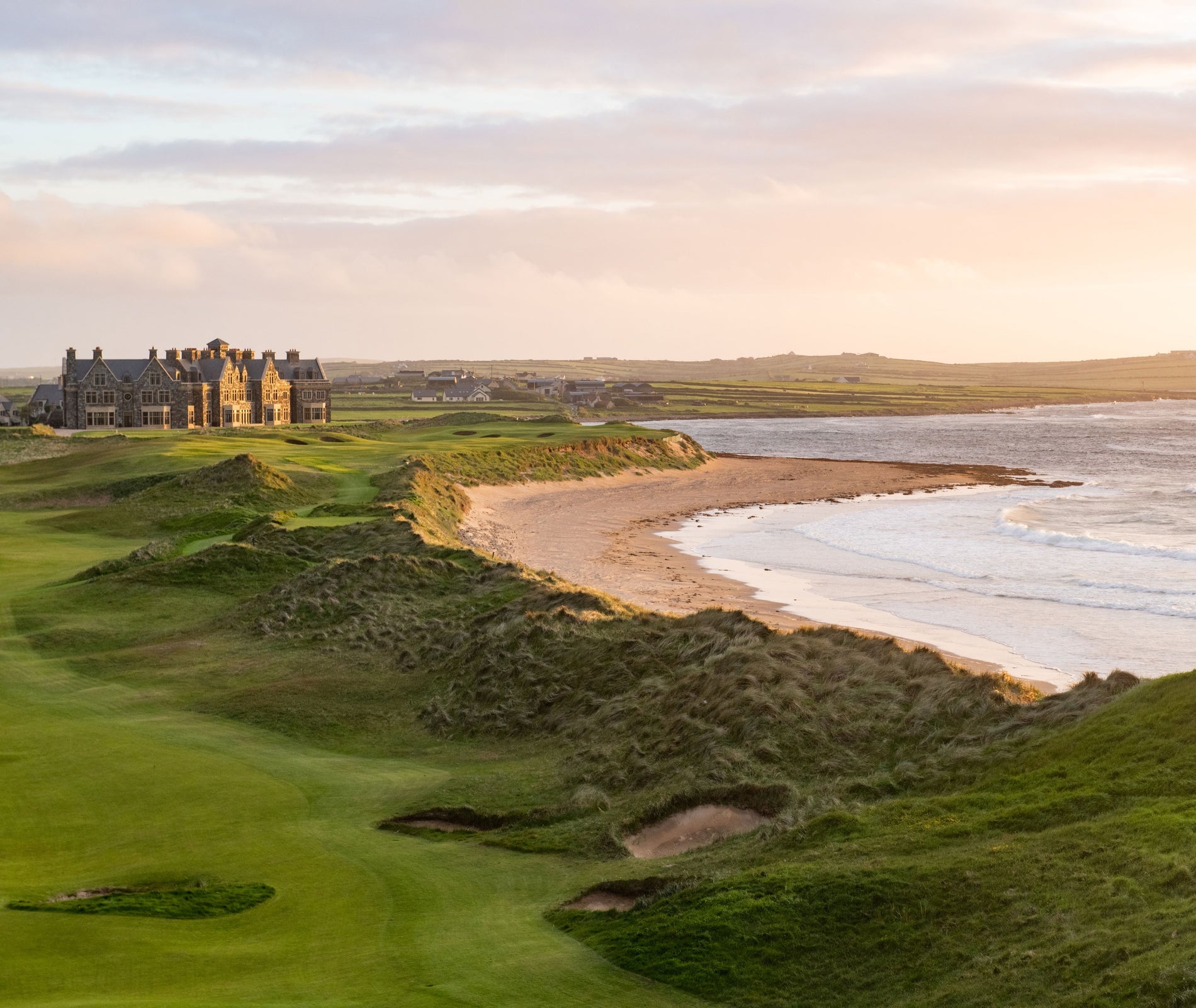 A coastal beach view of Trump International Golf Links Doonbeg