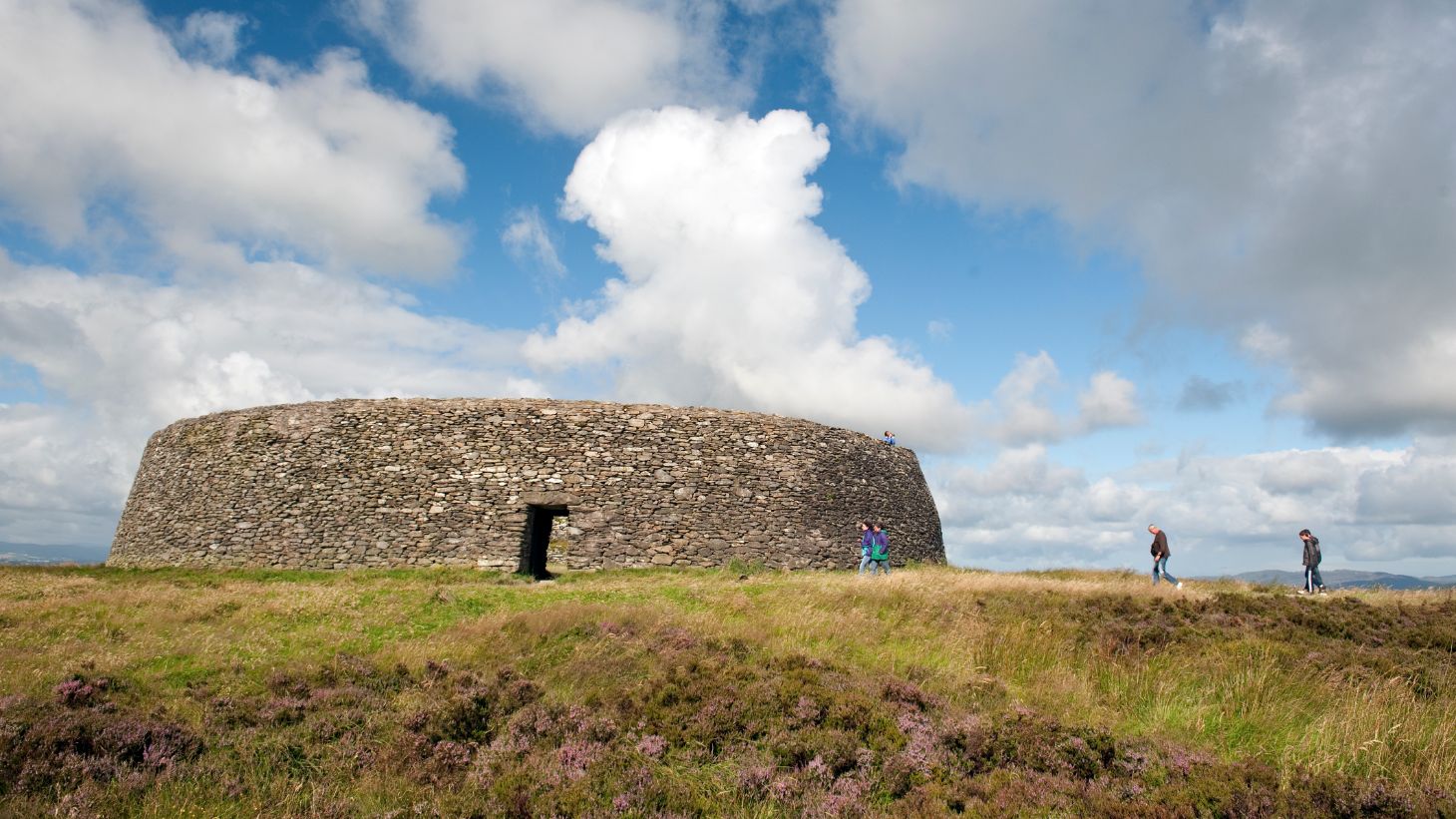 People walking towards the ruins of Grianan of Aileach, Donegal
