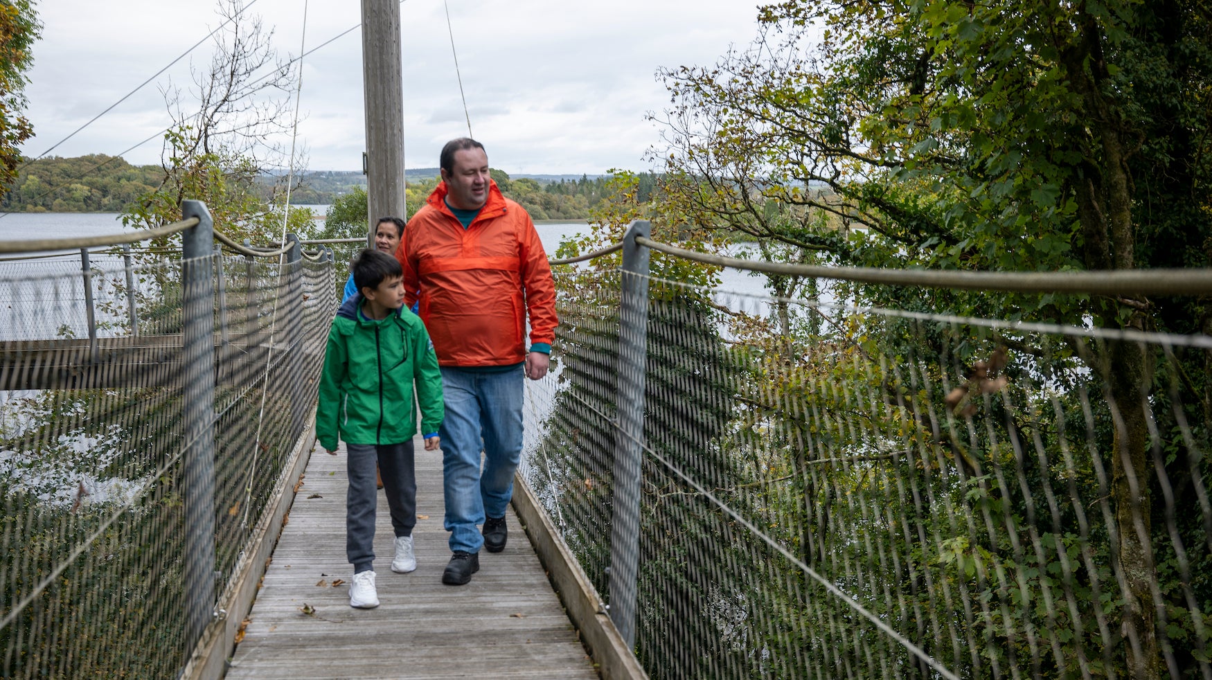 A family on the Canopy Walk in Lough Key Forest Park, Co Roscommon
