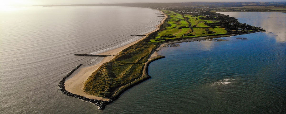 An aerial view of the course jutting out into the harbour