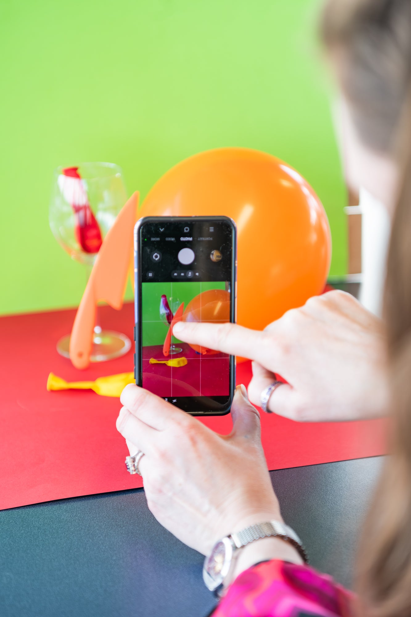 Someone is taking a photo with a smartphone.