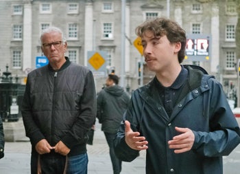 Historical Walking Tour of Dublin guide in front of Trinity College