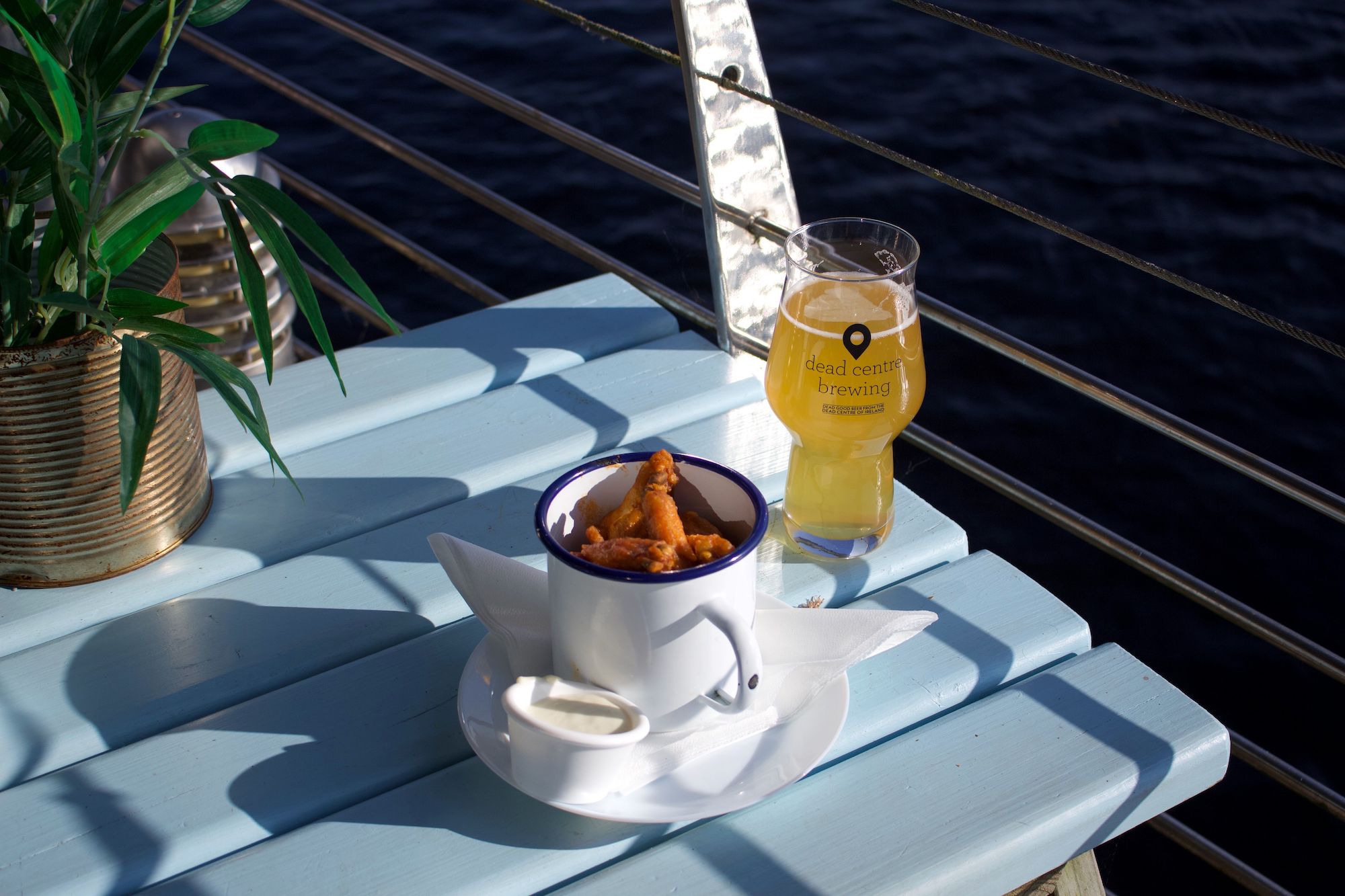 A pint and a bowl of wings on a table at the Dead Centre Brewing in Athlone, County Westmeath.
