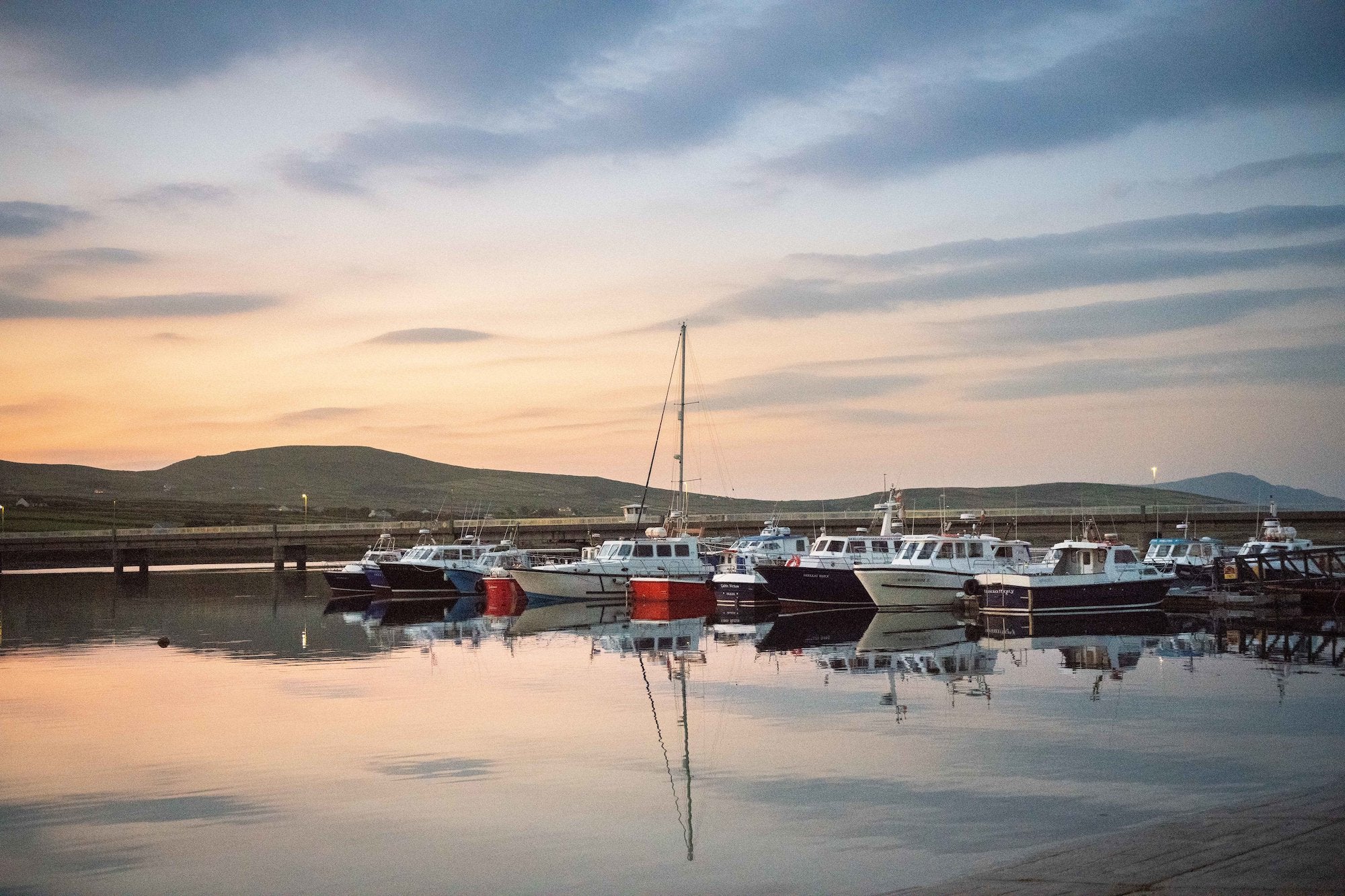 Boats docked in Portmagee Harbour in County Kerry.