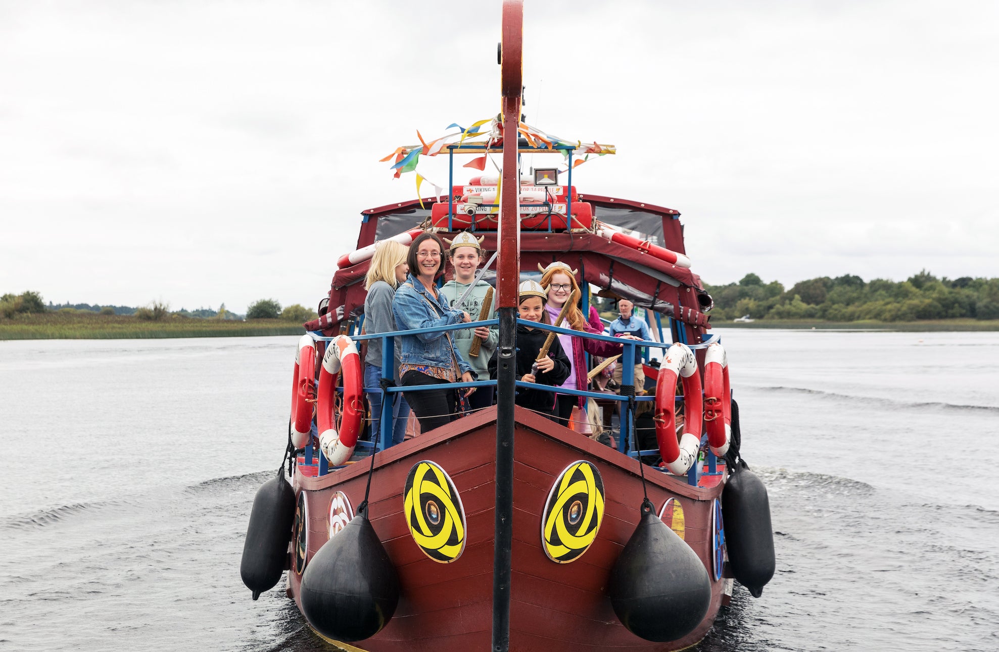 A group of people enjoying a Viking Tour on Lough Ree in Westmeath.