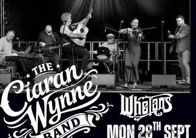 Ciarán Wynne Band playing on a stage