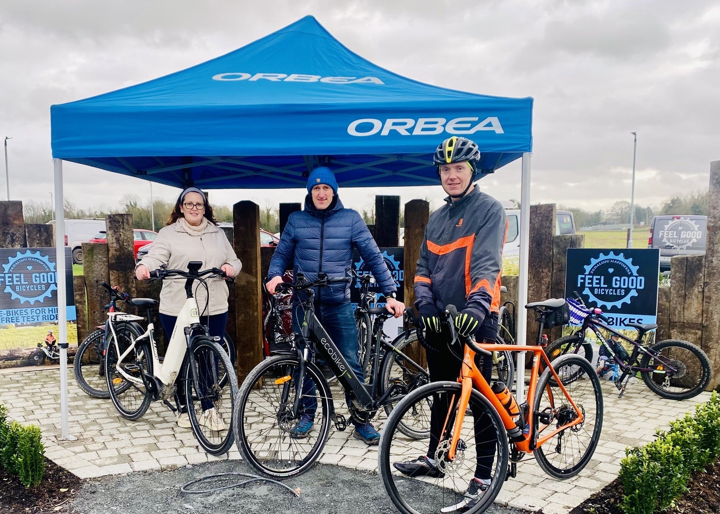 Three people with their hired bikes posing for the camera
