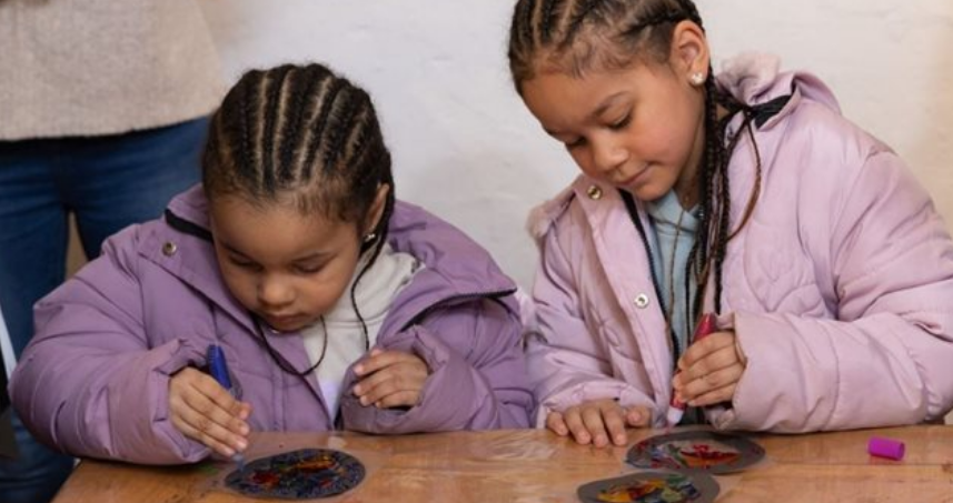 Children engaging with arts and crafts activity