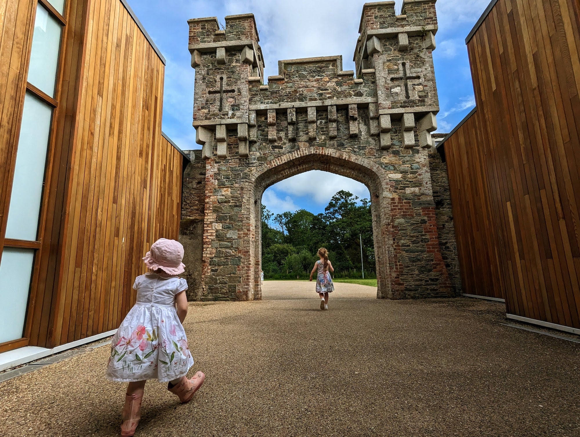 Little girls exploring Johnstown Castle Estate gardens at Easter.