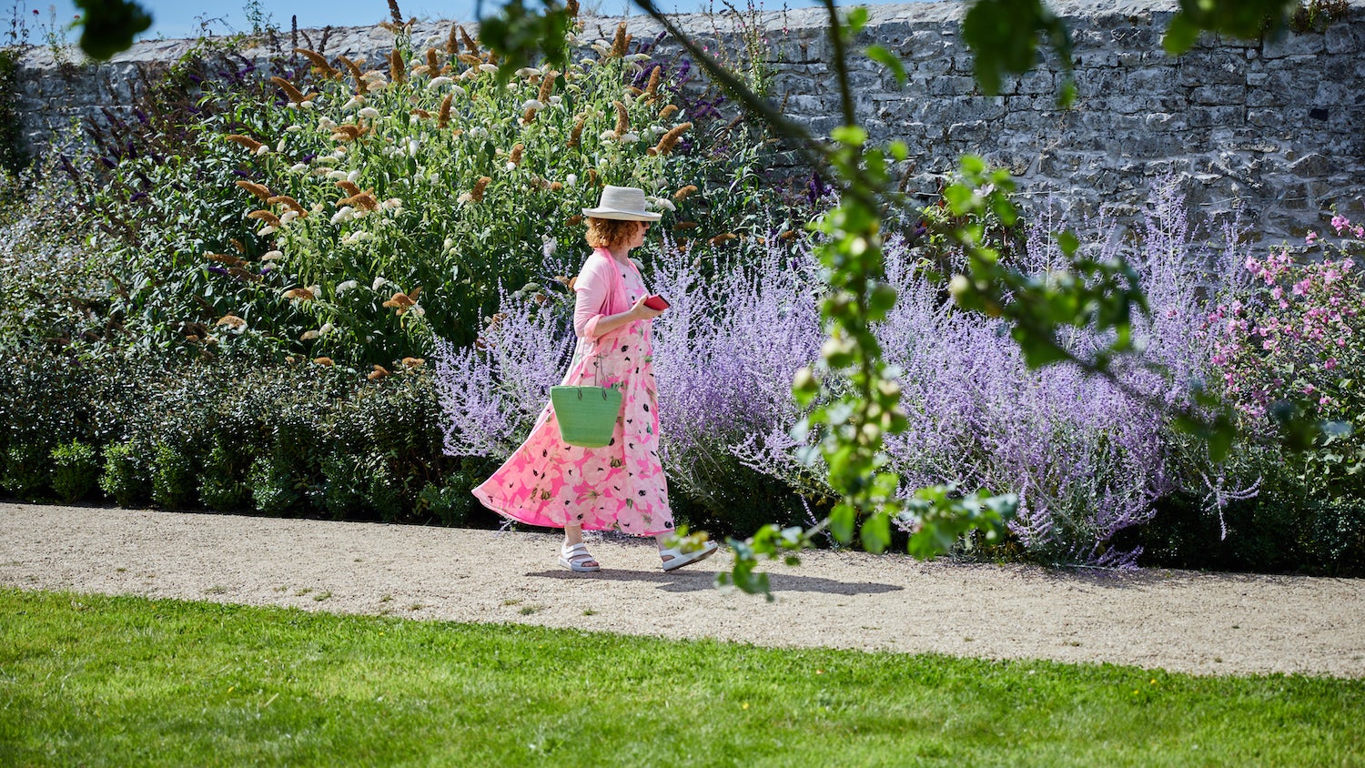 A woman in the walled garden at Emo Court in Co Laois